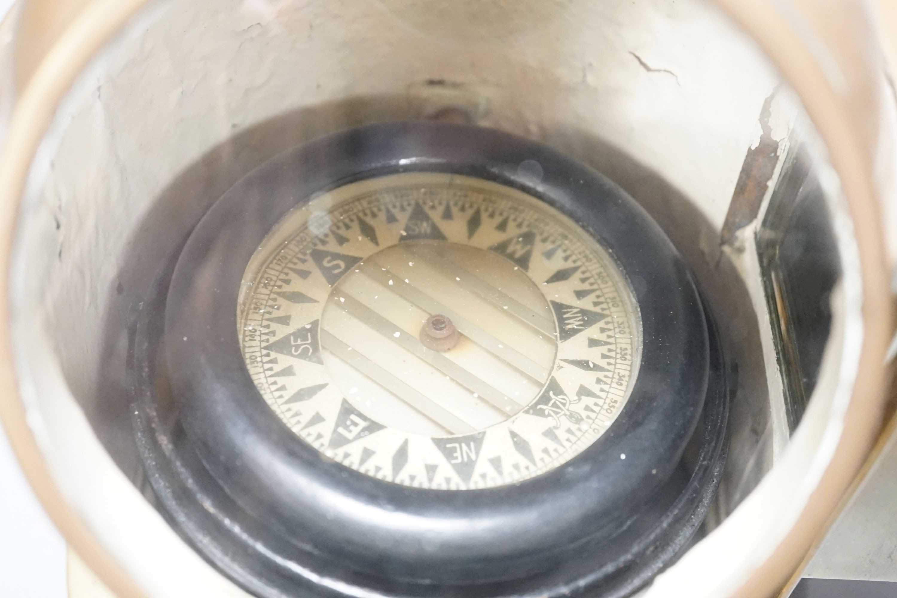 A brass ship's binnacle compass, 22cms wide x 22 cms high.